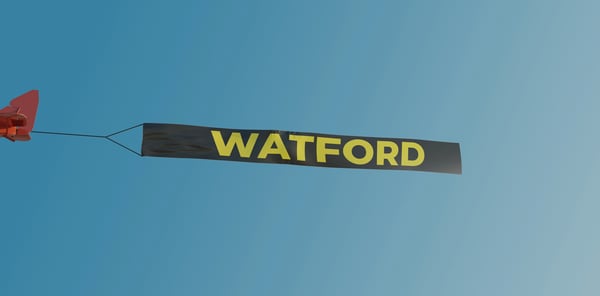 Watford sign on the back of a plane