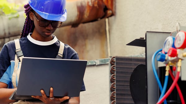 engineer on site using software